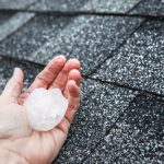 Hail,In,Hand,On,A,Rooftop,After,Hailstorm